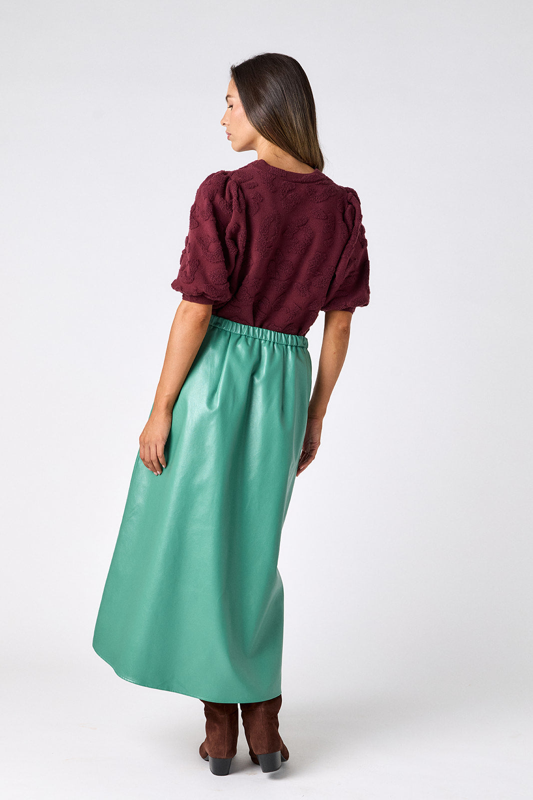 Malachite voluminous faux leather A-line skirt on model – CROSBY by Mollie Burch