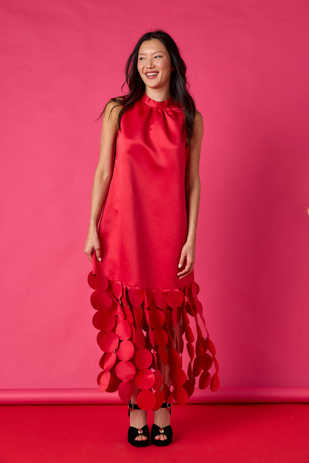 Red satin festive party dress on model – CROSBY by Mollie Burch