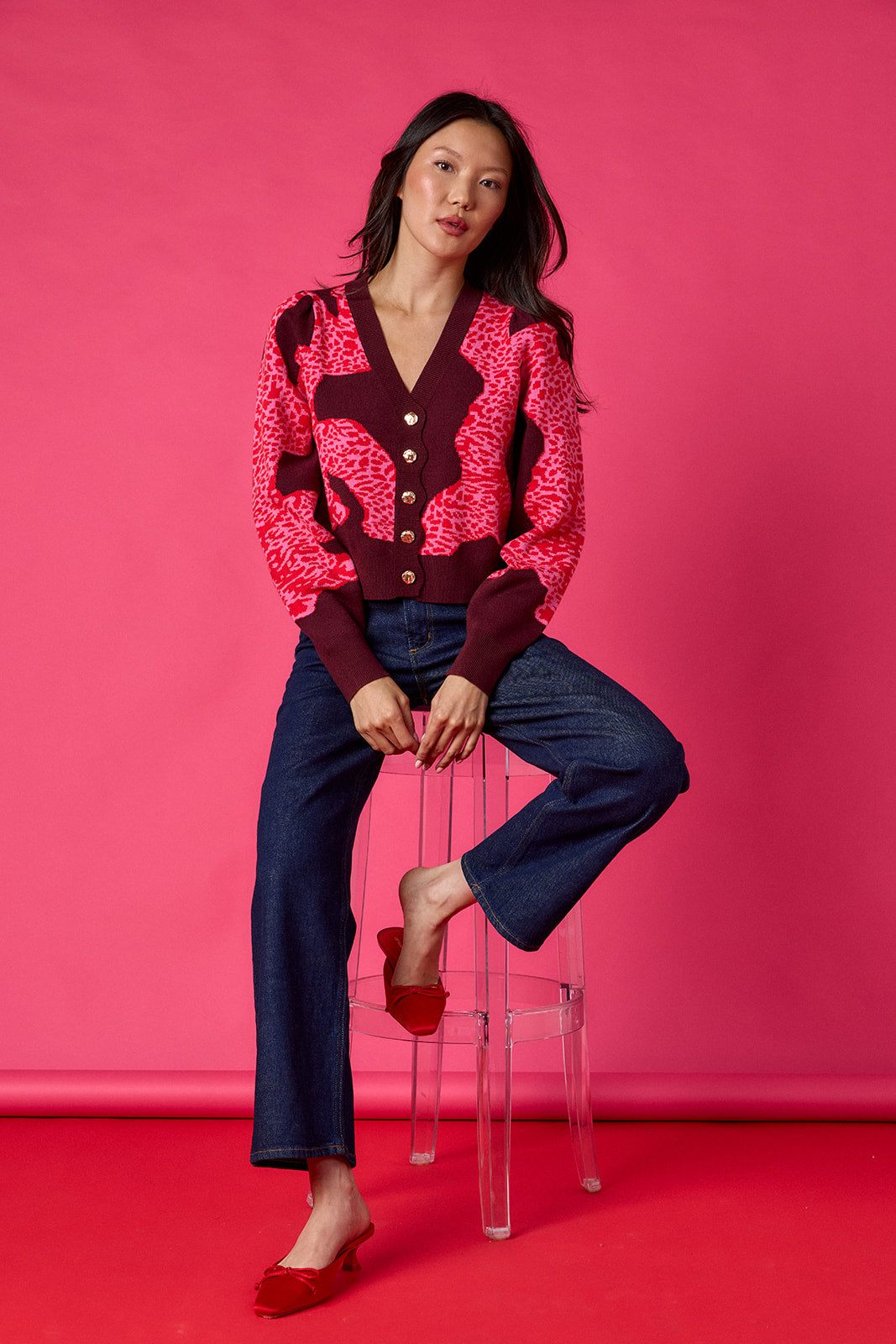 Catwalk Pink v-neck cardigan with scallop detail on model – CROSBY by Mollie Burch