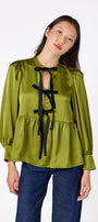 Renny Top featuring festive velvet bow detailing on model – CROSBY by Mollie Burch