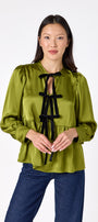 Renny Top featuring festive velvet bow detailing on model – CROSBY by Mollie Burch
