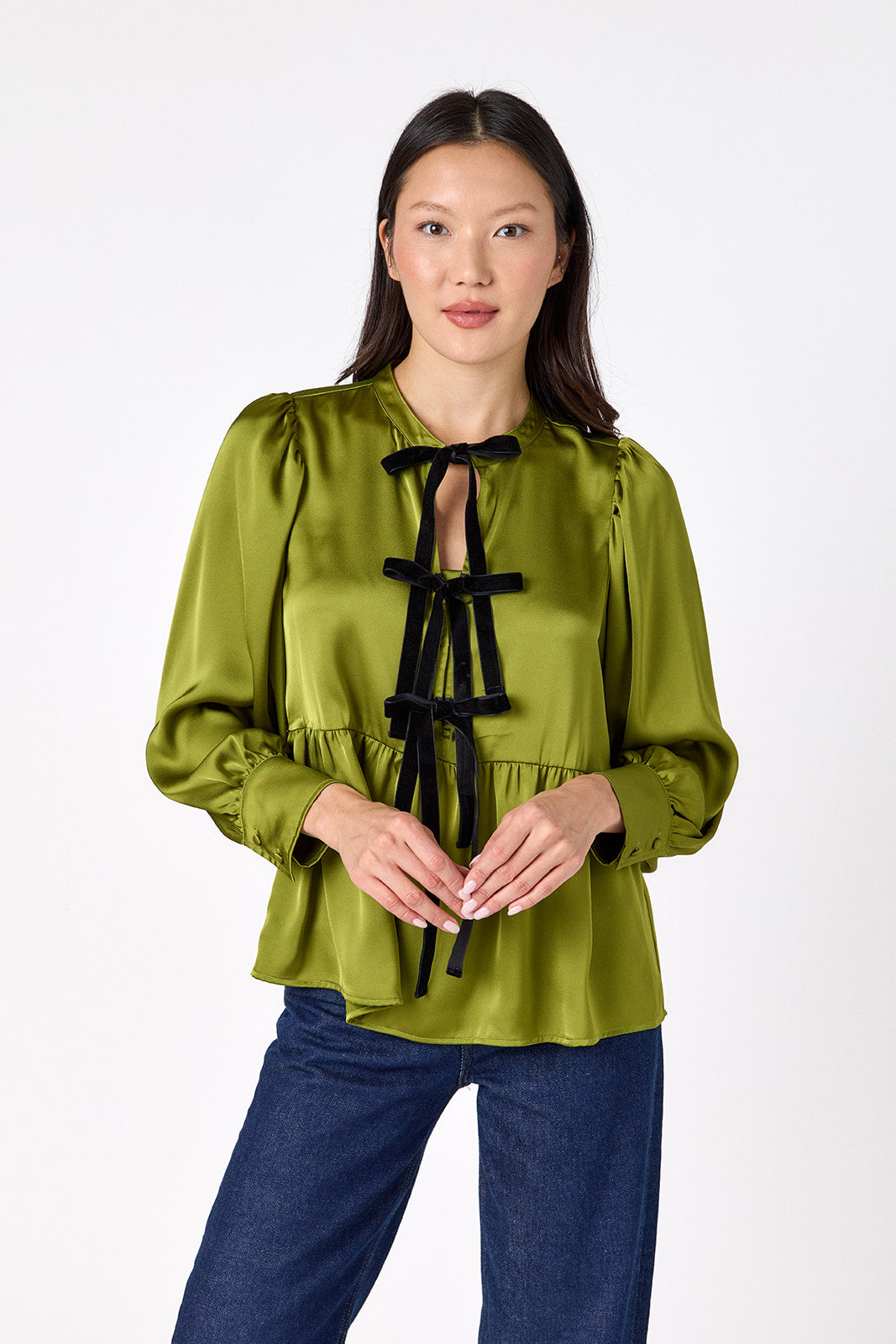 Renny Top featuring festive velvet bow detailing on model – CROSBY by Mollie Burch