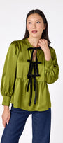Renny Top featuring festive velvet bow detailing on model – CROSBY by Mollie Burch