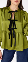 Renny Top featuring festive velvet bow detailing on model – CROSBY by Mollie Burch