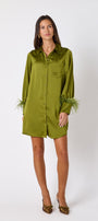 Crawford Dress in Martini featuring ostrich feather cuffs and button-front detailing on model – CROSBY by Mollie Burch