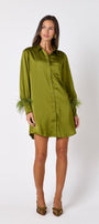 Crawford Dress in Martini featuring ostrich feather cuffs and button-front detailing on model – CROSBY by Mollie Burch