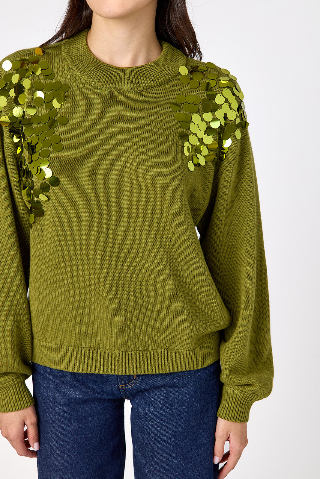 Martini drop shoulder sweater with sequin detailing on model – CROSBY by Mollie Burch