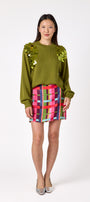 Martini drop shoulder sweater with sequin detailing on model – CROSBY by Mollie Burch