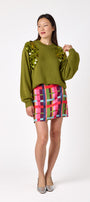 Martini drop shoulder sweater with sequin detailing on model – CROSBY by Mollie Burch