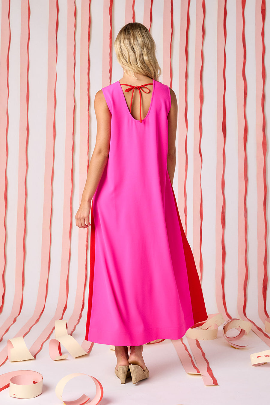Mollie Pink voluminous sleeveless maxi dress on model — CROSBY by Mollie Burch