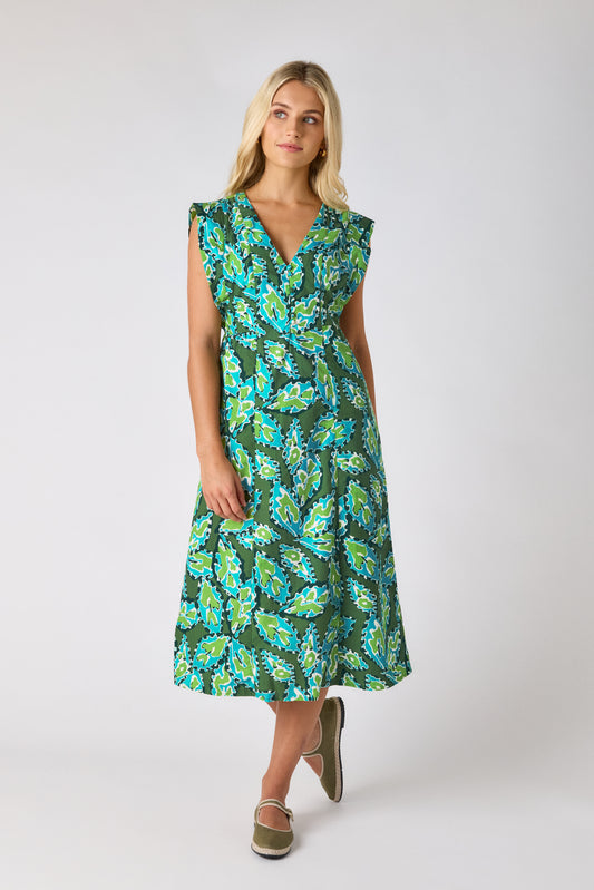 Moss Mirage A-line midi dress on model — CROSBY by Mollie Burch
