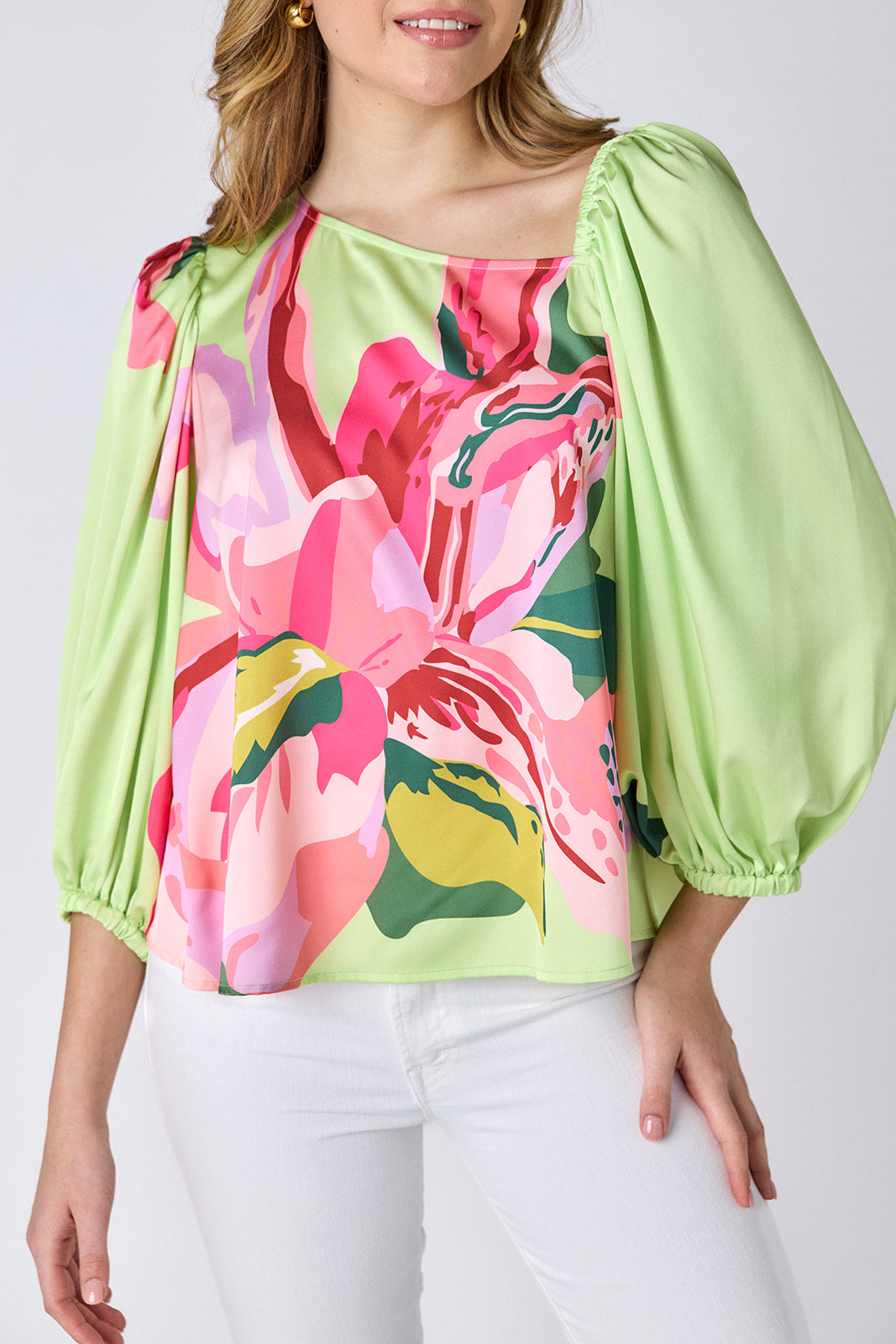 Orchid 3/4 sleeve top with asymmetrical neckline on model — CROSBY by Mollie Burch