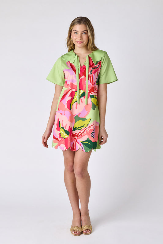 Orchid mini dress with scalloped collar and hem on model — CROSBY by Mollie Burch