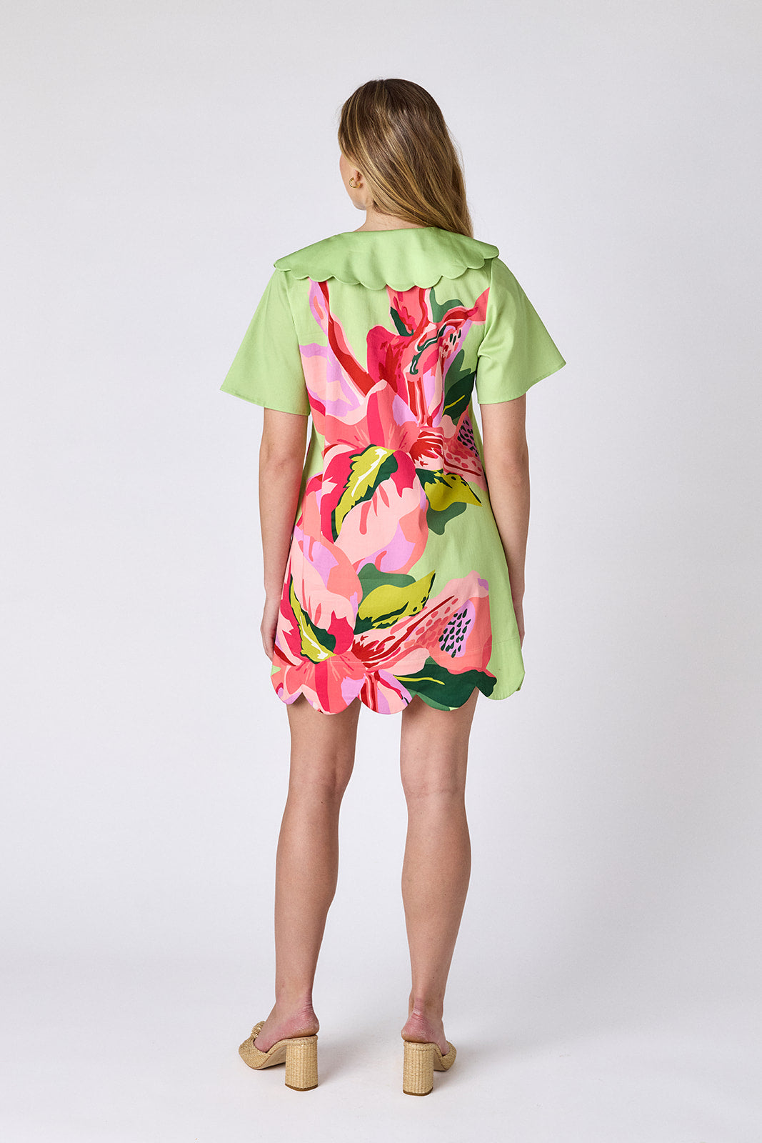 Orchid mini dress with scalloped collar and hem on model — CROSBY by Mollie Burch