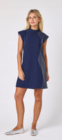 Oxford Navy A-line dress with faux leather detail on model — CROSBY by Mollie Burch