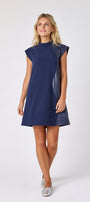 Oxford Navy A-line dress with faux leather detail on model — CROSBY by Mollie Burch