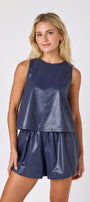 Oxford Navy leather shorts with matching boxy tank on model — CROSBY by Mollie Burch