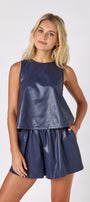 Oxford Navy leather shorts with matching boxy tank on model — CROSBY by Mollie Burch