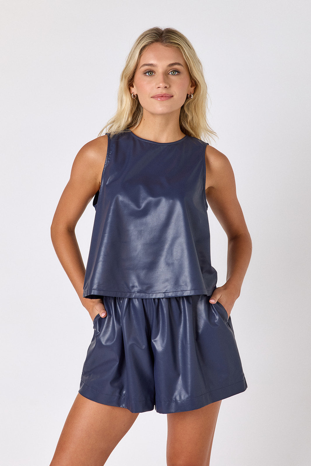 Oxford Navy leather shorts with matching boxy tank on model — CROSBY by Mollie Burch