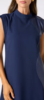 Oxford Navy A-line dress with faux leather detail on model — CROSBY by Mollie Burch