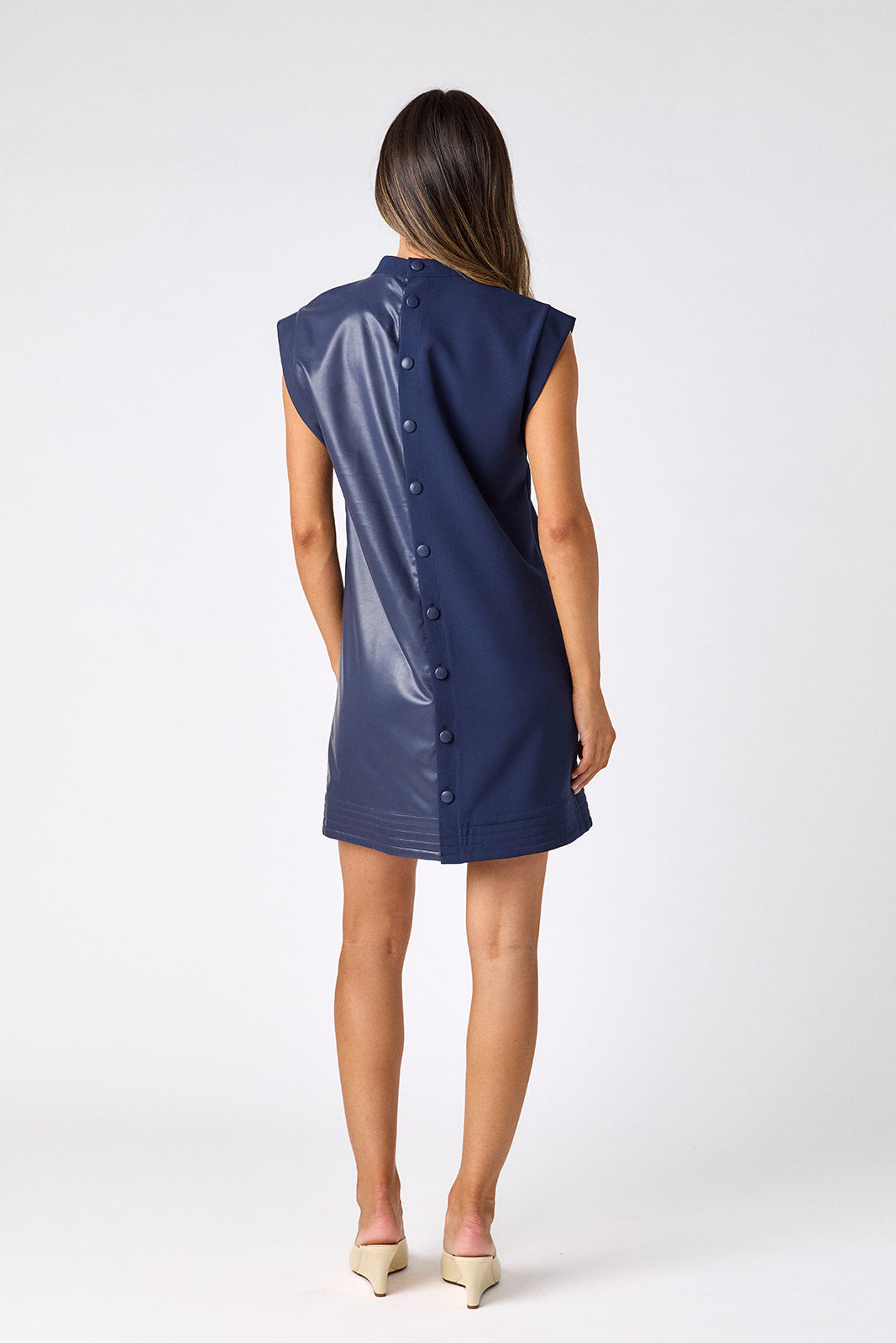 Oxford Navy A-line dress with faux leather detail on model — CROSBY by Mollie Burch