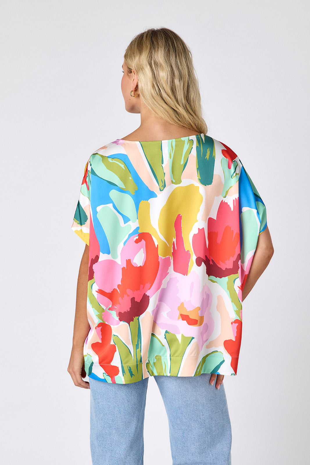 Painted Petals oversized short sleeve tunic on model — CROSBY by Mollie Burch