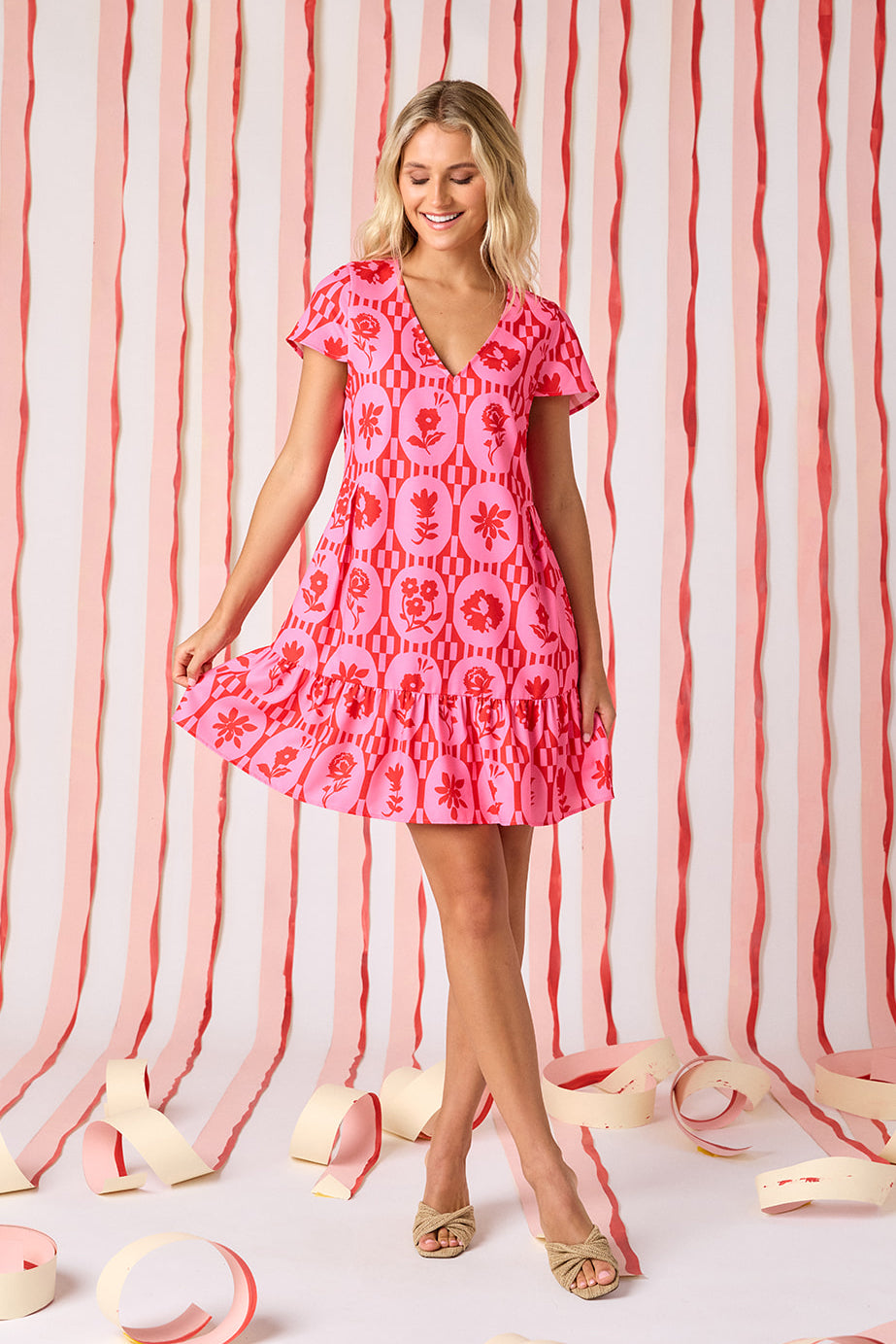 Parterre Floral V-neck short sleeve dress with flounce on model — CROSBY by Mollie Burch