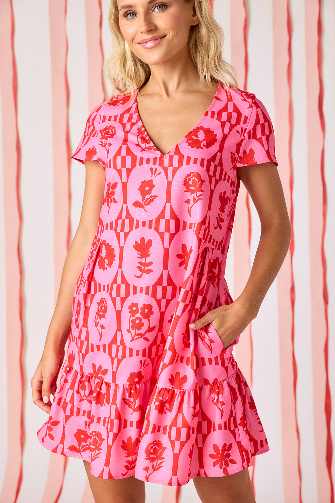 Parterre Floral V-neck short sleeve dress with flounce on model — CROSBY by Mollie Burch