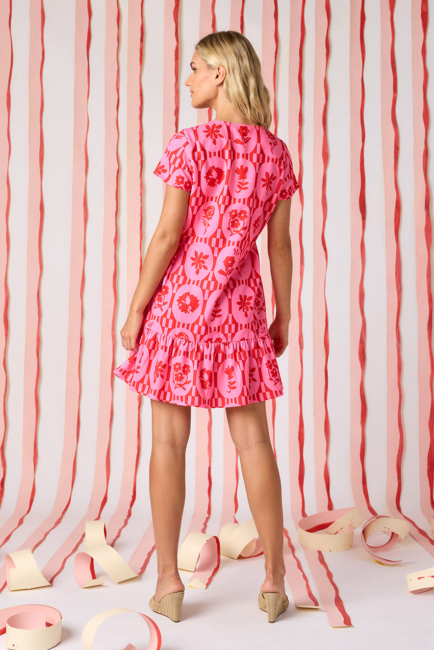 Parterre Floral V-neck short sleeve dress with flounce on model — CROSBY by Mollie Burch