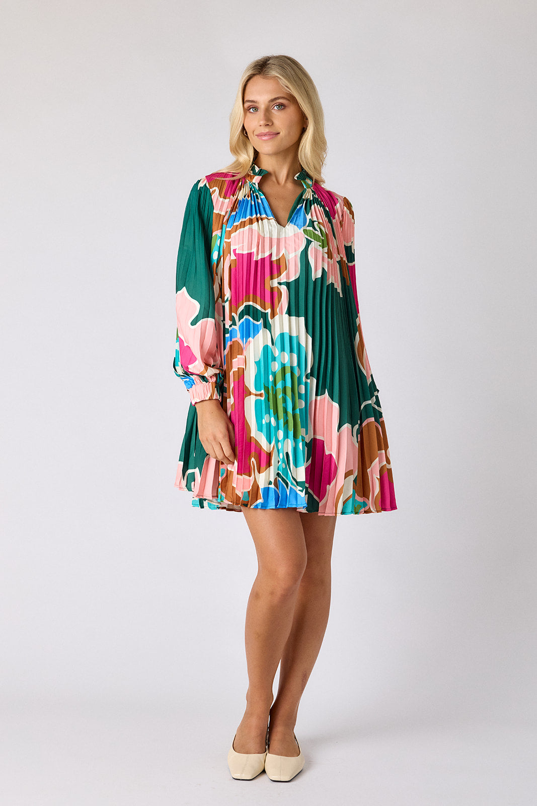 Petal Pop pleated tent dress on model — CROSBY by Mollie Burch