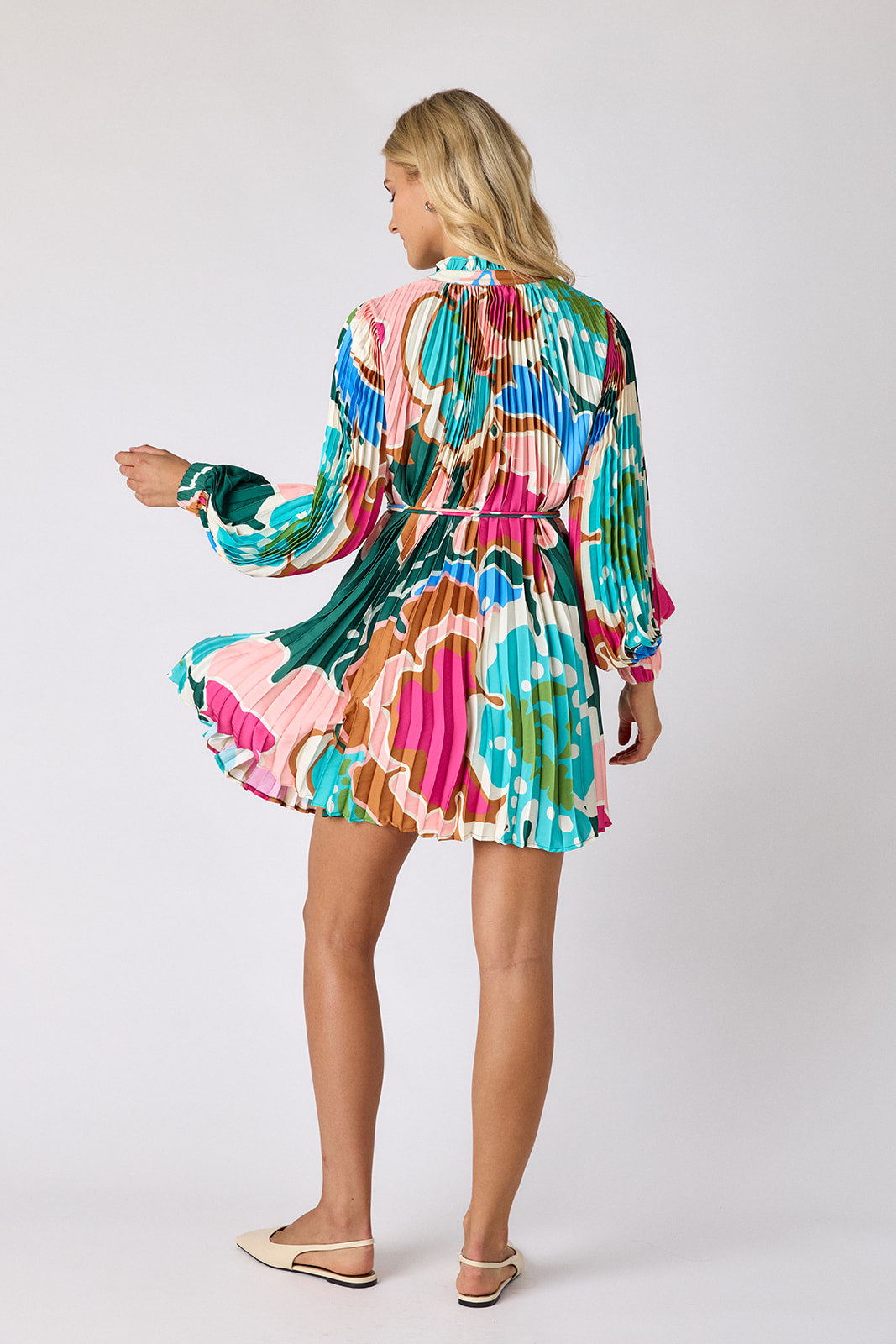 Petal Pop pleated tent dress on model — CROSBY by Mollie Burch
