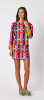 Maya Top in Plaid Parade featuring contrast fringe sleeve cuffs and back neck tie detailing on model – CROSBY by Mollie Burch