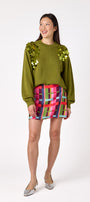  Penny Mini Skirt in Plaid Parade featuring a colorful plaid print on model – CROSBY by Mollie Burch