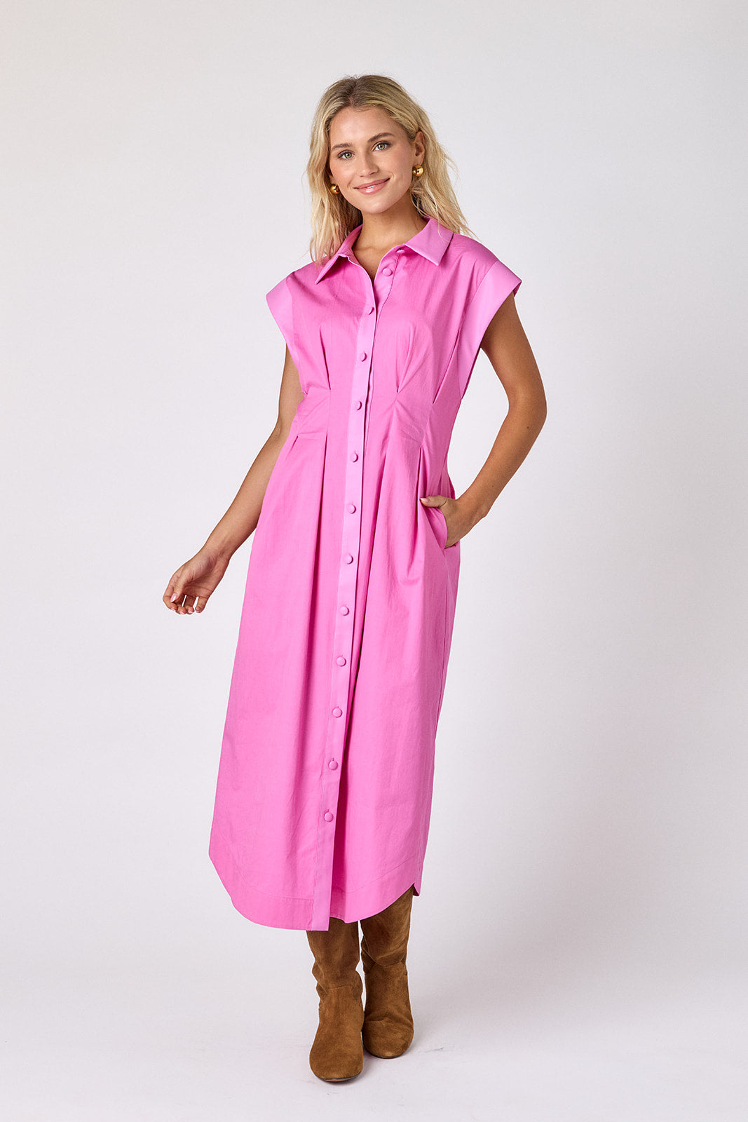 Poppy Pink collared button down dress with waist emphasis on model — CROSBY by Mollie Burch
