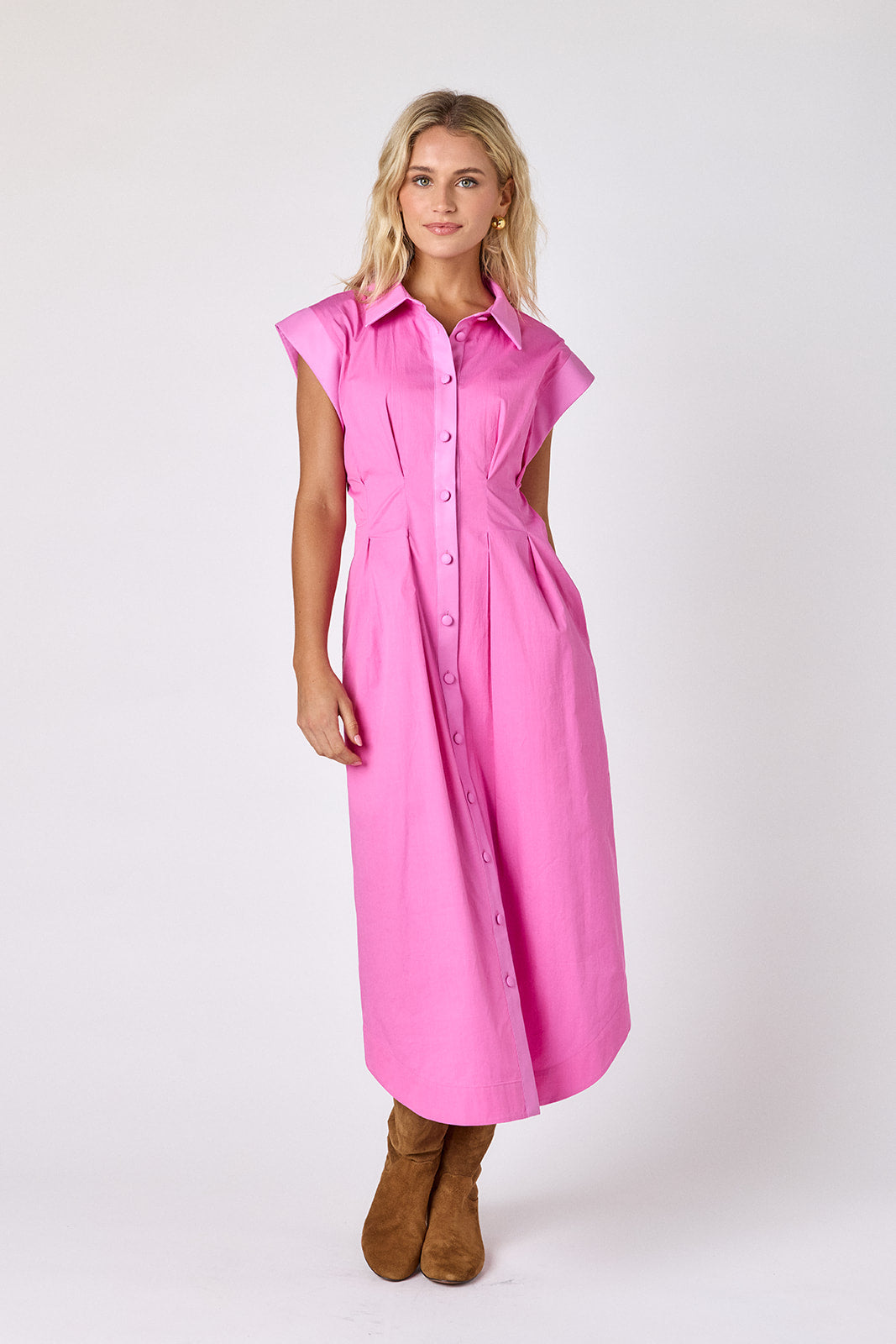 Poppy Pink collared button down dress with waist emphasis on model — CROSBY by Mollie Burch
