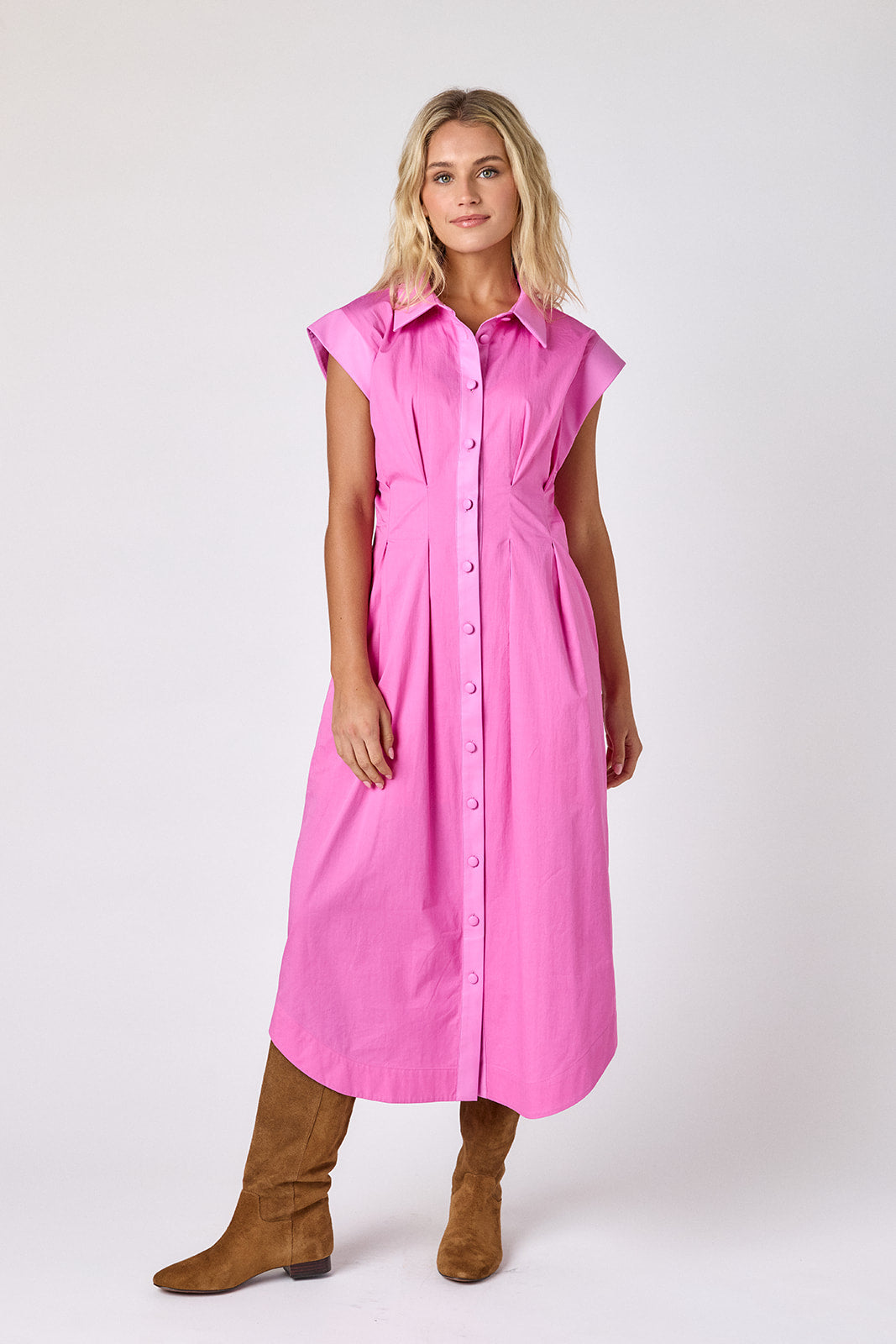 Poppy Pink collared button down dress with waist emphasis on model — CROSBY by Mollie Burch