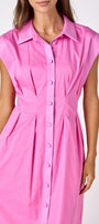 Poppy Pink collared button down dress with waist emphasis on model — CROSBY by Mollie Burch