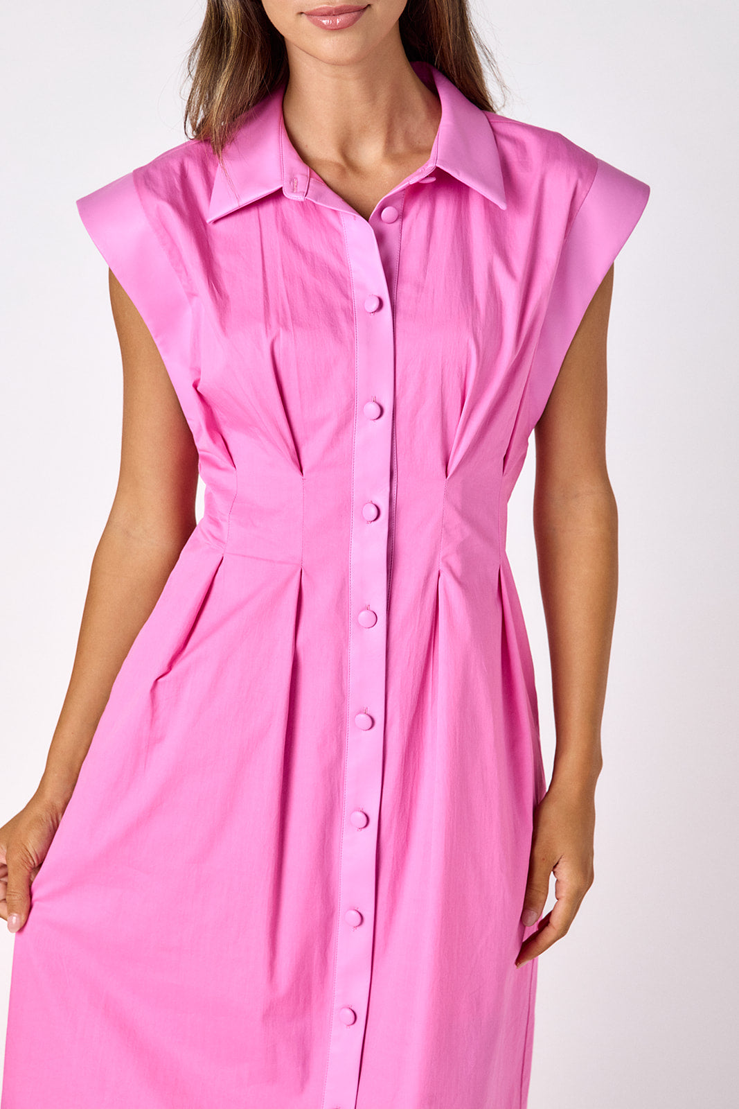 Poppy Pink collared button down dress with waist emphasis on model — CROSBY by Mollie Burch