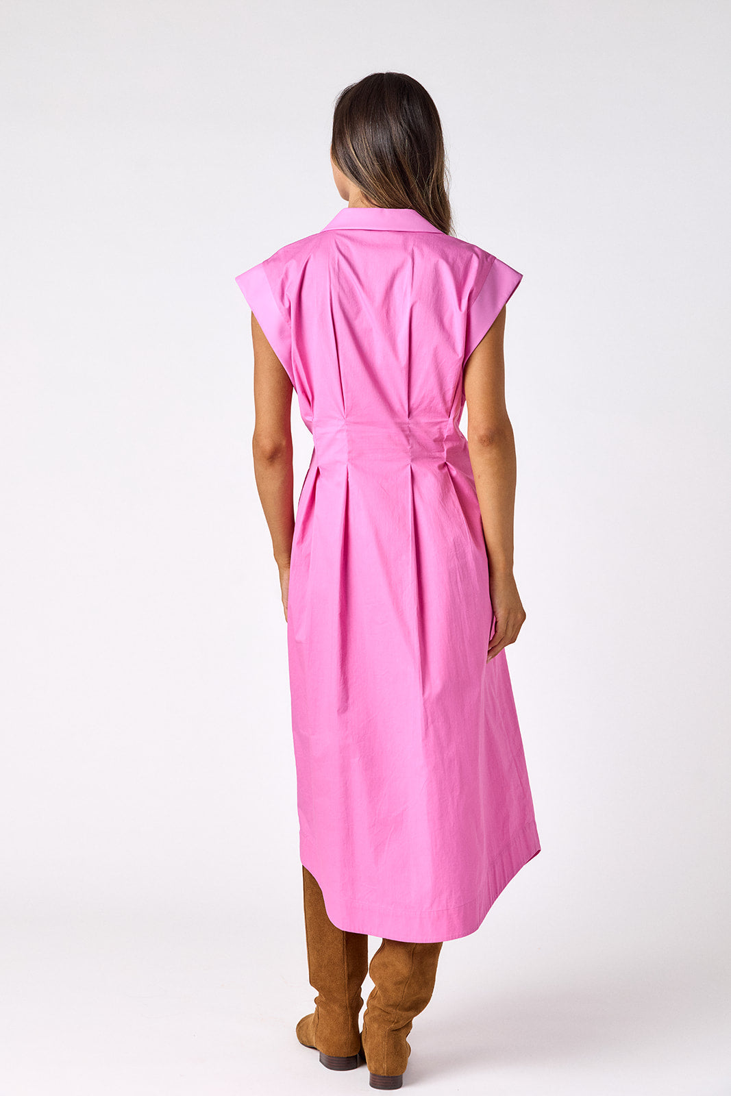 Poppy Pink collared button down dress with waist emphasis on model — CROSBY by Mollie Burch