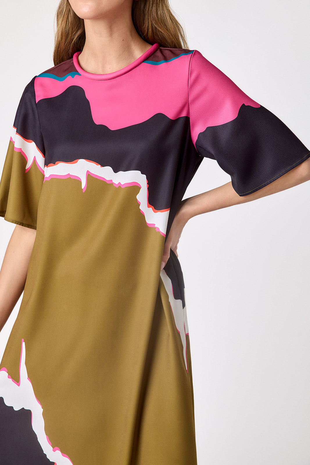 Portoro short sleeve ankle-length dress with a straight fit on model – CROSBY by Mollie Burch