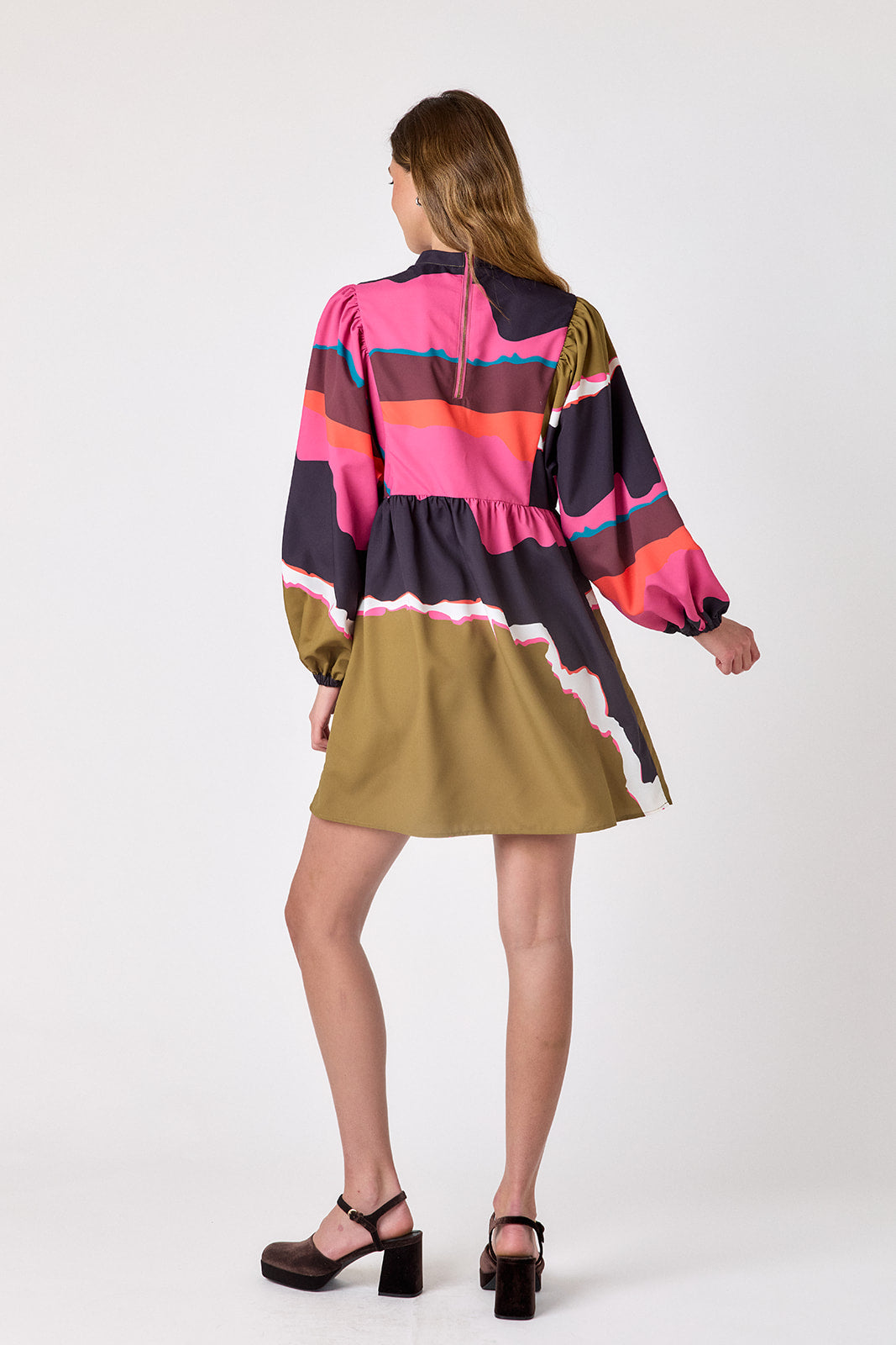 Portoro above-the-knee dress with balloon sleeves on model – CROSBY by Mollie Burch