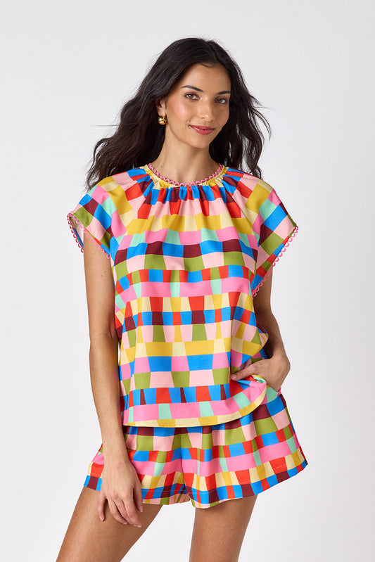 Prism relaxed mid-thigh short on model — CROSBY by Mollie Burch