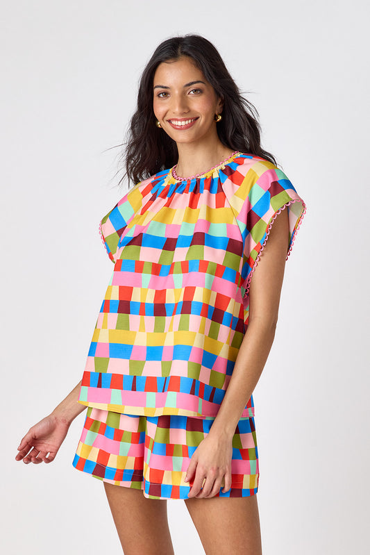 Prism relaxed mid-thigh short on model — CROSBY by Mollie Burch
