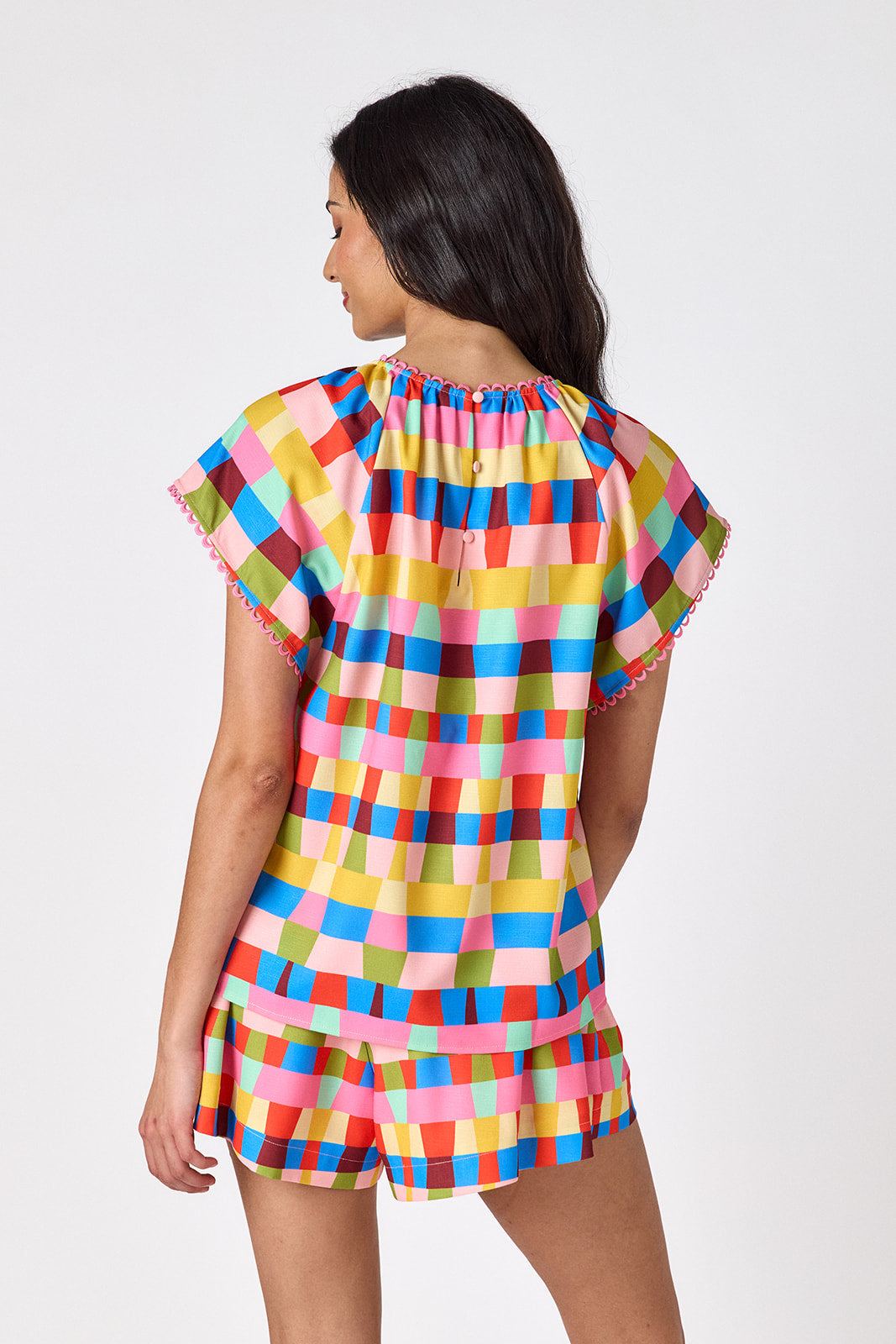 Prism relaxed mid-thigh short on model — CROSBY by Mollie Burch