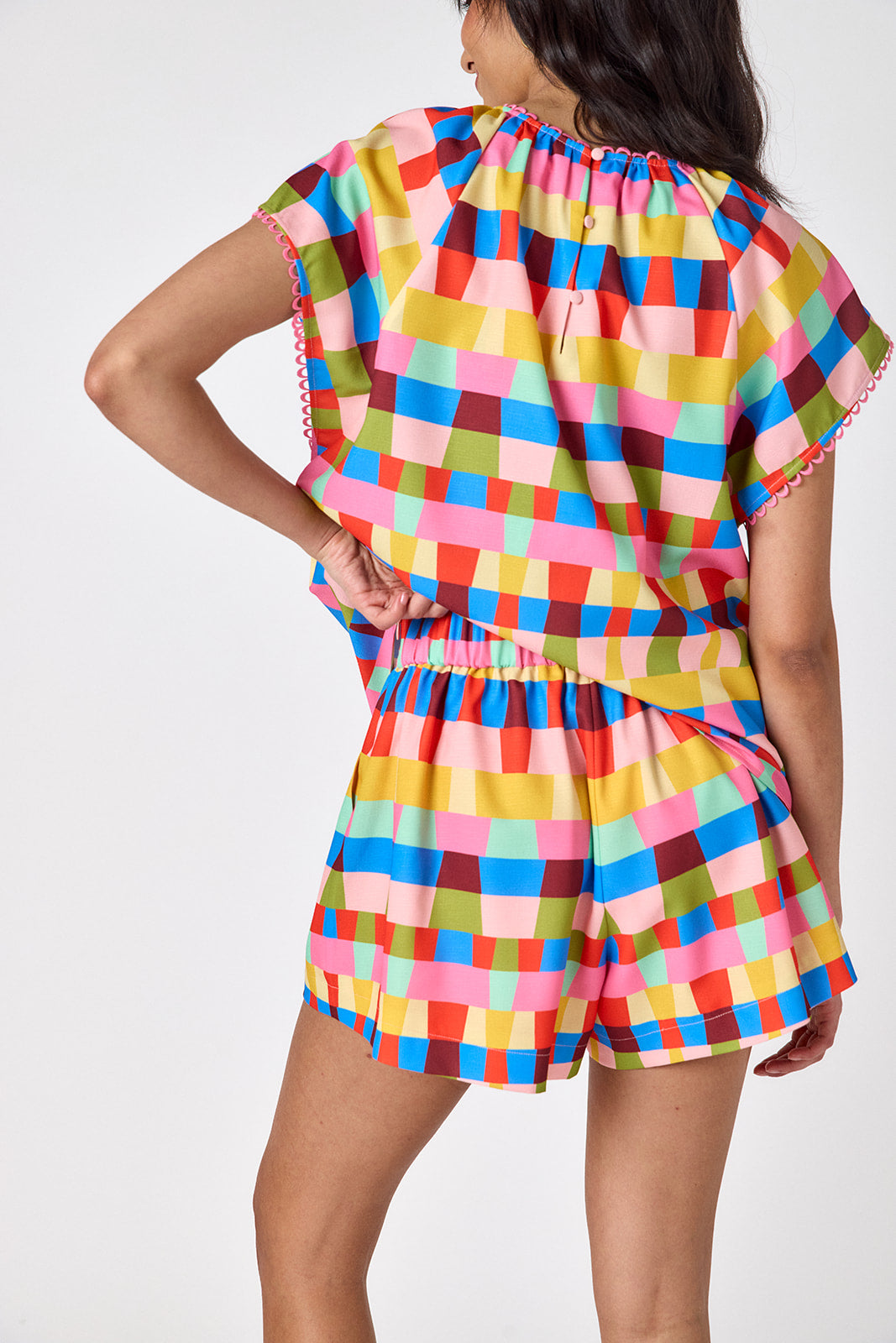Prism relaxed mid-thigh short on model — CROSBY by Mollie Burch