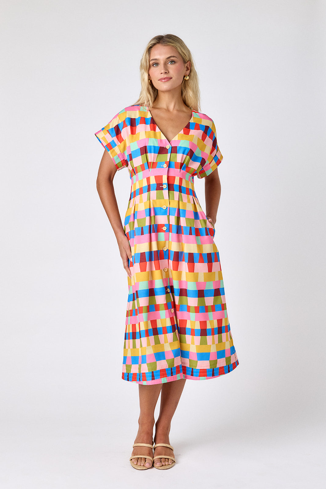 Prism short sleeved button-front midi dress with waist emphasis on model — CROSBY by Mollie Burch