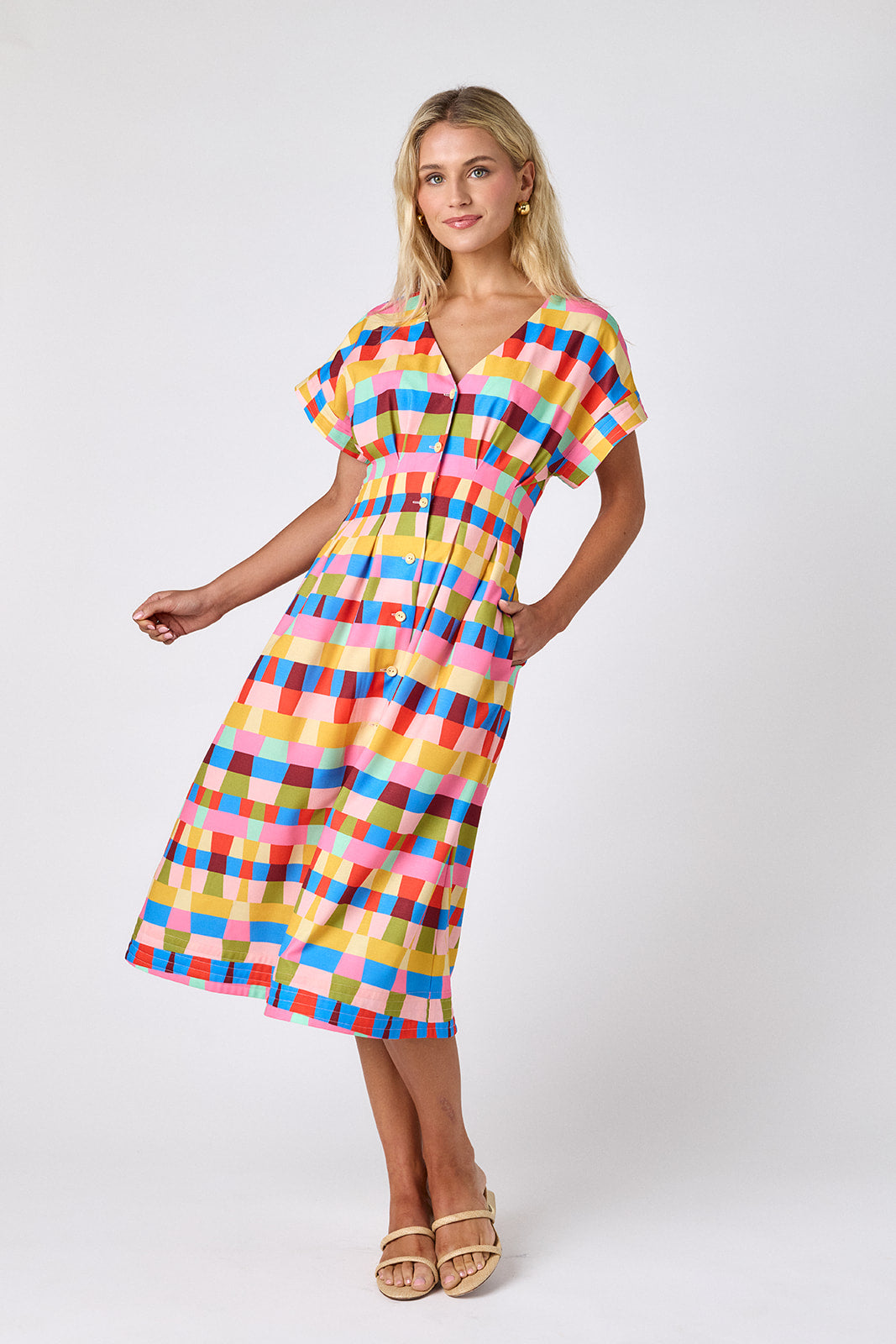 Prism short sleeved button-front midi dress with waist emphasis on model — CROSBY by Mollie Burch