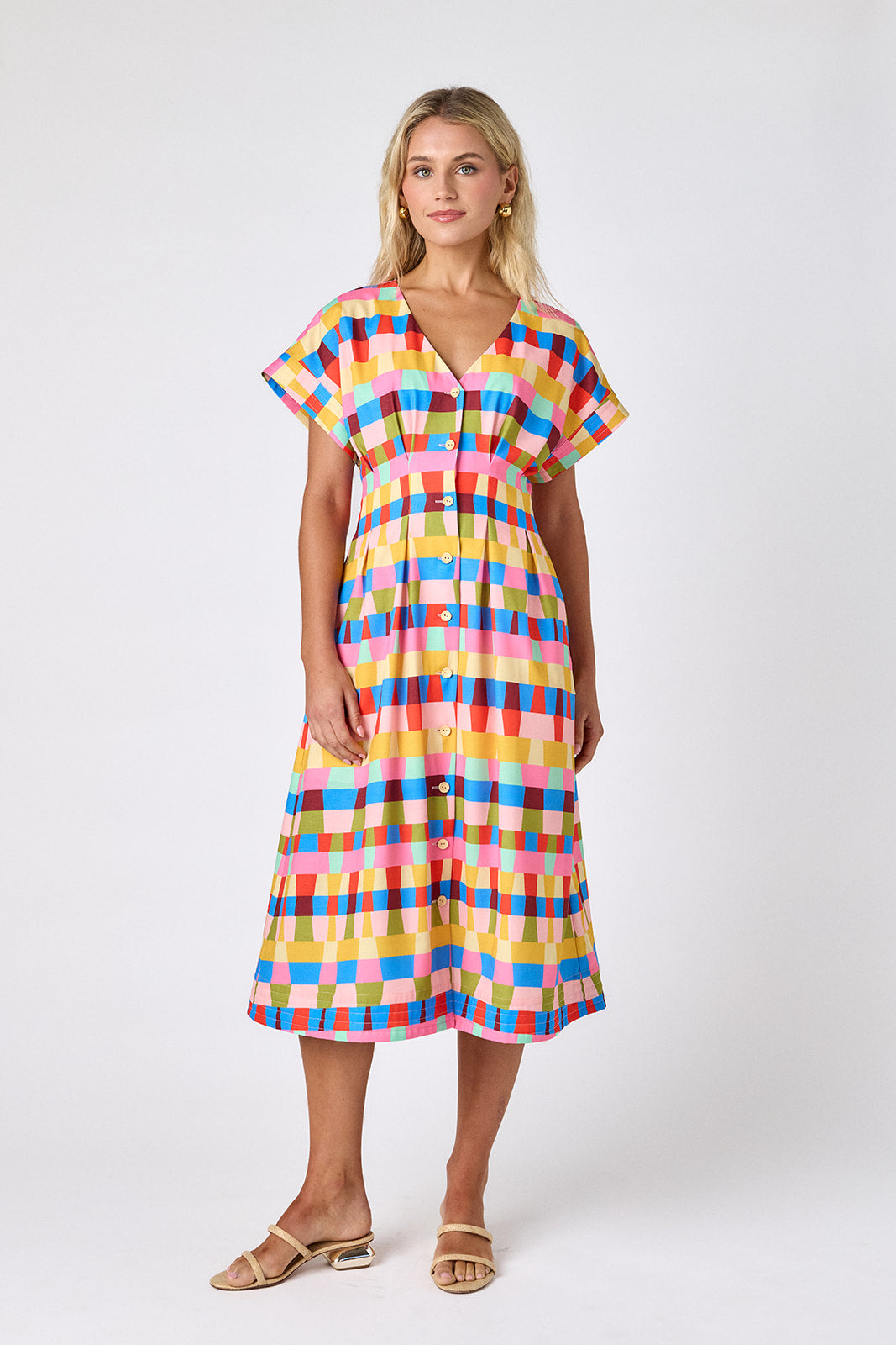 Prism short sleeved button-front midi dress with waist emphasis on model — CROSBY by Mollie Burch