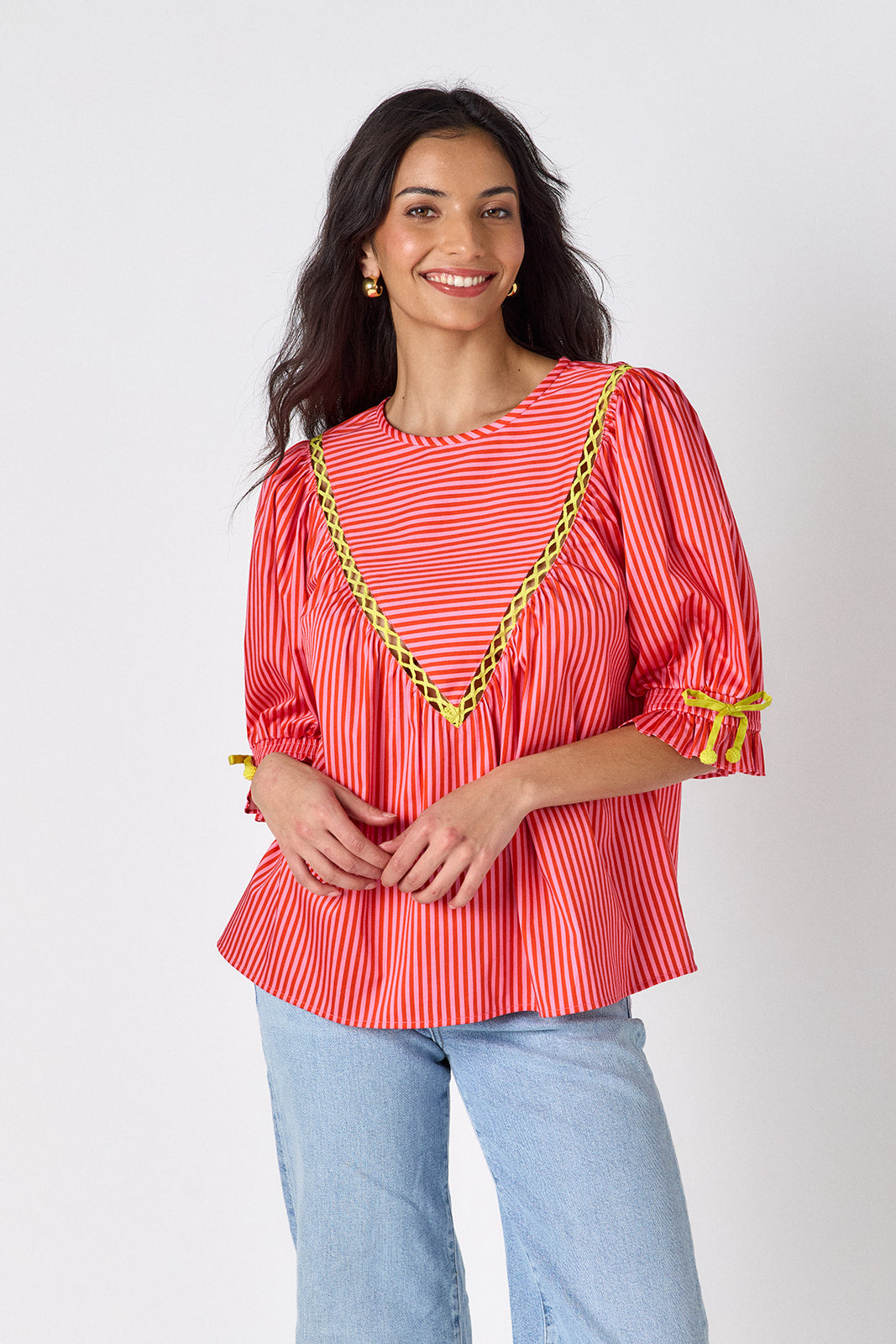 Orchid puff sleeve top with tie detail on model — CROSBY by Mollie Burch