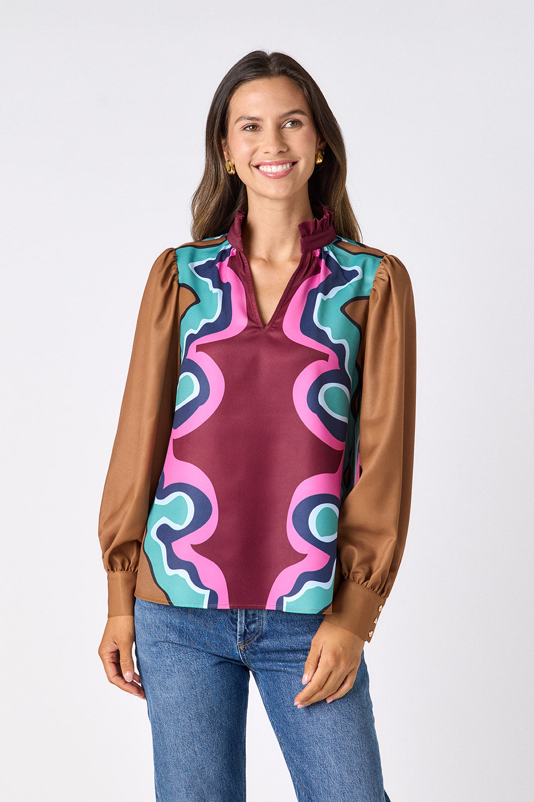 Serpentine relaxed fit long-sleeve blouse with ruffle standing collar on model – CROSBY by Mollie Burch